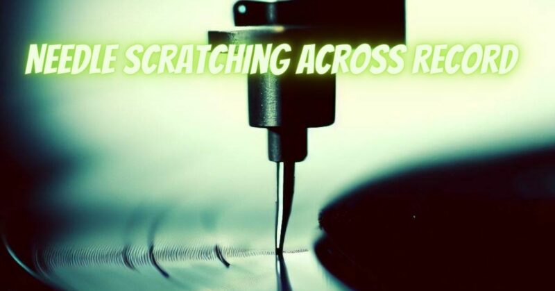 Needle scratching across record