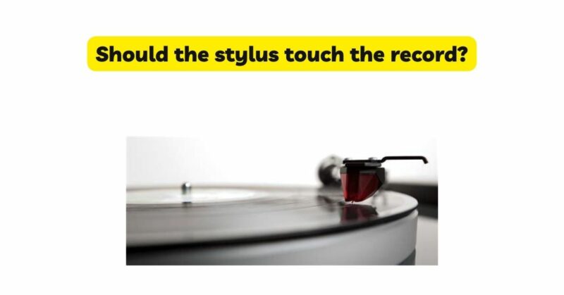 Should the stylus touch the record?