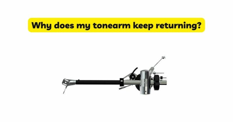 Why does my tonearm keep returning?