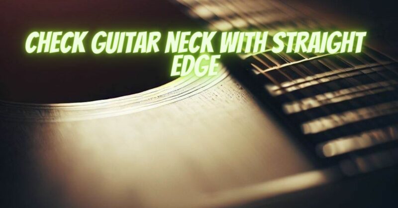 Check guitar neck with straight edge