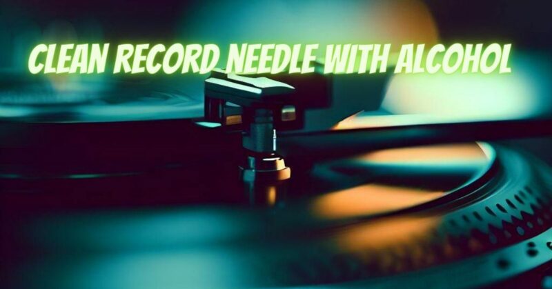 Clean record needle with alcohol