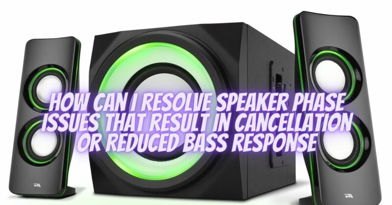 How can I resolve speaker phase issues that result in cancellation or reduced bass response