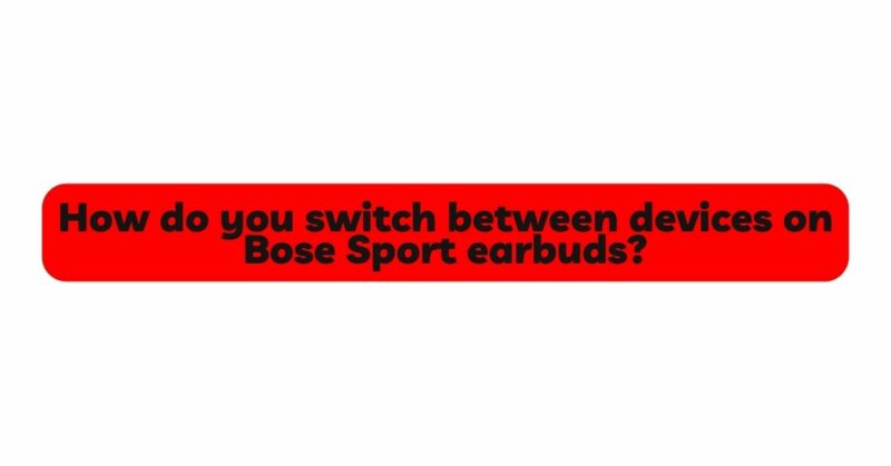 How do you switch between devices on Bose Sport earbuds?