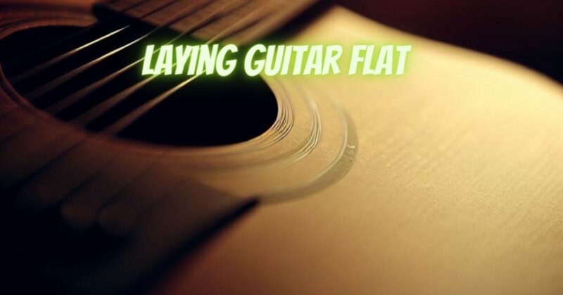 Laying guitar flat