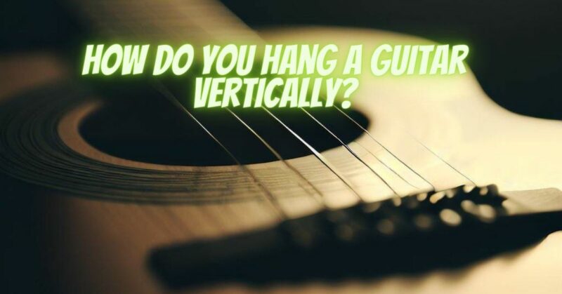 How do you hang a guitar vertically?