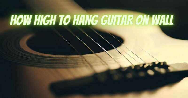 How high to hang guitar on wall