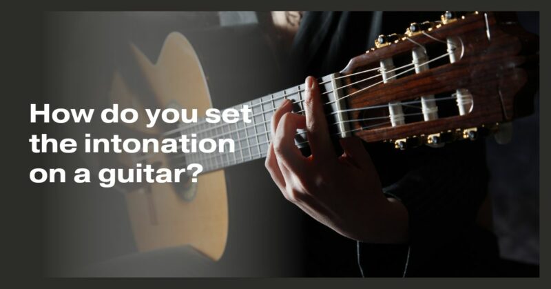 How do you set the intonation on a guitar?