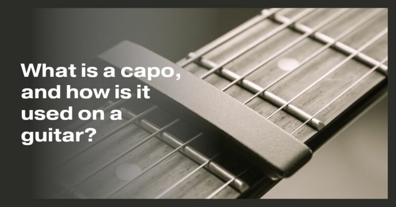 What is a capo, and how is it used on a guitar?