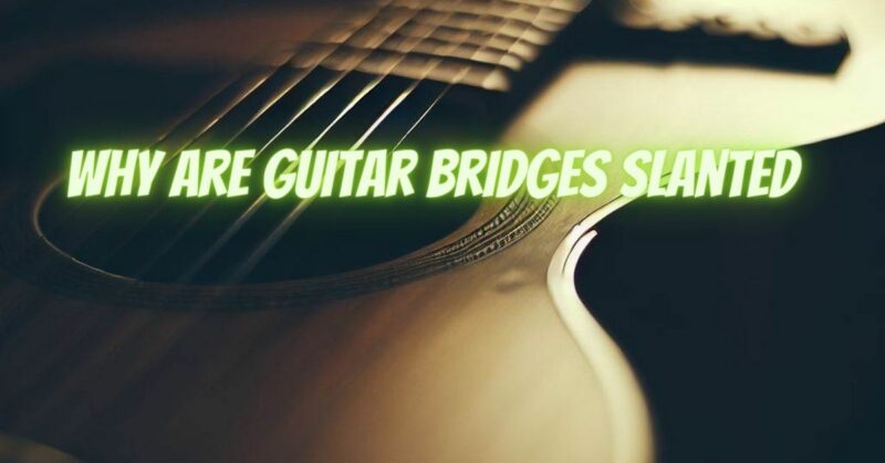 Why are guitar bridges slanted