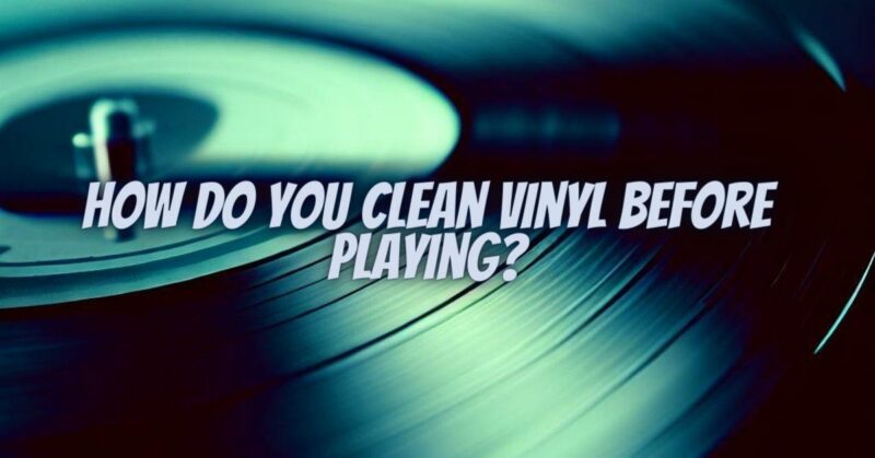 How do you clean vinyl before playing?